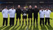 5 March 2023; Match officials, from left, umpire Eoghan Fitzpatrick, umpire Johnny Farrell, linesman Chris Ryan, referee Brendan Cawley, linesman John Gilmartin, sideline official Martin Flaherty, umpire Paddy McDermott and umpire Dave Coady before the Allianz Football League Division 1 match between Roscommon and Mayo at Dr Hyde Park in Roscommon. Photo by Piaras Ó Mídheach/Sportsfile