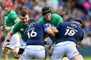 12 March 2023; Ryan Baird of Ireland is tackled by Fraser Brown and Simon Berghan of Scotland during the Guinness Six Nations Rugby Championship match between Scotland and Ireland at BT Murrayfield Stadium in Edinburgh, Scotland. Photo by Brendan Moran/Sportsfile