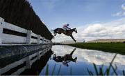 14 March 2023; Harper's Brook, with Tom Cannon up, jump the water during the Ultima Handicap Chase during day one of the Cheltenham Racing Festival at Prestbury Park in Cheltenham, England. Photo by Harry Murphy/Sportsfile