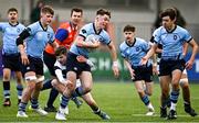 14 March 2023; Matthew Haugh of St Michael's College tackled by Charlie Callaghan of Belvedere College during the Bank of Ireland Leinster Rugby Schools Junior Cup Semi Final match between Belvedere College and St Michael’s College at Energia Park in Dublin. Photo by Sam Barnes/Sportsfile