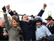 14 March 2023; Trainer Henry de Bromhead, his wife Heather, left, and winning jockey Rachael Blackmore after they sent out Honeysuckle to win the Close Brothers Mares' Hurdle during day one of the Cheltenham Racing Festival at Prestbury Park in Cheltenham, England. Photo by Seb Daly/Sportsfile