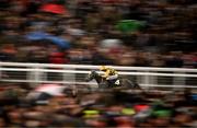 14 March 2023; Gaillard Du Mesnil, with Patrick Mullins up, on their way to winning the WellChild National Hunt Challenge Cup Amateur Jockeys' Novices' Chase during day one of the Cheltenham Racing Festival at Prestbury Park in Cheltenham, England. Photo by Harry Murphy/Sportsfile