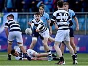 14 March 2023; Charlie Callaghan of Belvedere College passes to team-mate Jonny Garrihy during the Bank of Ireland Leinster Rugby Schools Junior Cup Semi Final match between Belvedere College and St Michael’s College at Energia Park in Dublin. Photo by Sam Barnes/Sportsfile