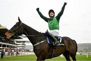 15 March 2023; Jockey Paul Townend celebrates on Impaire Et Passe after winning the Ballymore Novices' Hurdle during day two of the Cheltenham Racing Festival at Prestbury Park in Cheltenham, England. Photo by Seb Daly/Sportsfile