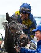 15 March 2023; Jockey Harry Skelton celebrates on Lander Dan after winning the Coral Cup Handicap Hurdle during day two of the Cheltenham Racing Festival at Prestbury Park in Cheltenham, England. Photo by Harry Murphy/Sportsfile