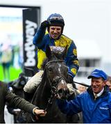 15 March 2023; Jockey Harry Skelton celebrates on Lander Dan after winning the Coral Cup Handicap Hurdle during day two of the Cheltenham Racing Festival at Prestbury Park in Cheltenham, England. Photo by Harry Murphy/Sportsfile