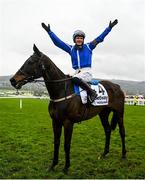 15 March 2023; Jockey Paul Townend celebrates on Energumene after winning the Betway Queen Mother Champion Chase during day two of the Cheltenham Racing Festival at Prestbury Park in Cheltenham, England. Photo by Seb Daly/Sportsfile