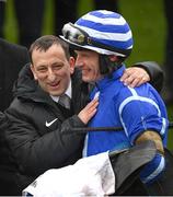 15 March 2023; Jockey Paul Townend celebrates with owner Tony Bloom after they won the Betway Queen Mother Champion Chase, with Energumene, during day two of the Cheltenham Racing Festival at Prestbury Park in Cheltenham, England. Photo by Seb Daly/Sportsfile