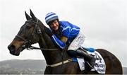 15 March 2023; Jockey Paul Townend celebrates on Energumene after winning the Betway Queen Mother Champion Chase during day two of the Cheltenham Racing Festival at Prestbury Park in Cheltenham, England. Photo by Seb Daly/Sportsfile