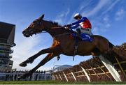14 March 2023; Love Envoi, right, with Jonathan Burke up, during the Close Brothers Mares' Hurdle during day one of the Cheltenham Racing Festival at Prestbury Park in Cheltenham, England. Photo by Seb Daly/Sportsfile