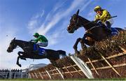 14 March 2023; Brandy Love, right, with Paul Townend up, and Echoes In Rain, with Patrick Mullins up, during the Close Brothers Mares' Hurdle during day one of the Cheltenham Racing Festival at Prestbury Park in Cheltenham, England. Photo by Seb Daly/Sportsfile