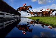 14 March 2023; The Big Breakaway, with Brendan Powell up, jump the waterjump during day one of the Cheltenham Racing Festival at Prestbury Park in Cheltenham, England. Photo by Harry Murphy/Sportsfile