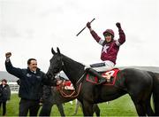 15 March 2023; Jockey Keith Donoghue and groom Darren Treacy celebrates with Delta Work after winning the Glenfarclas Cross Country Chase during day two of the Cheltenham Racing Festival at Prestbury Park in Cheltenham, England. Photo by Seb Daly/Sportsfile