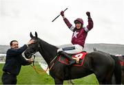 15 March 2023; Jockey Keith Donoghue and groom Darren Treacy celebrate with Delta Work after winning the Glenfarclas Cross Country Chase during day two of the Cheltenham Racing Festival at Prestbury Park in Cheltenham, England. Photo by Seb Daly/Sportsfile