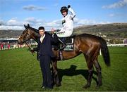 14 March 2023; Jockey Nico de Boinville celebrates on Constitutuion Hill, with handler Jaydon Lee, after the Unibet Champion Hurdle Challenge Trophy during day one of the Cheltenham Racing Festival at Prestbury Park in Cheltenham, England. Photo by Harry Murphy/Sportsfile