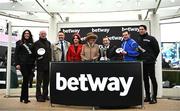 15 March 2023; Camilla, Queen Consort, with former Republic of Ireland international Robbie Keane, third from left, and former jockey Katie Walsh, fourth from left, make the presentaiton to winning connections of Energumene, trainer Willie Mullins, owner Tony Bloom, and jockey Paul Townend after winning the Betway Queen Mother Champion Chase on day two of the Cheltenham Racing Festival at Prestbury Park in Cheltenham, England. Photo by Harry Murphy/Sportsfile