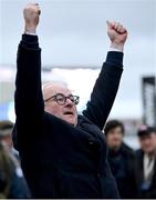 15 March 2023; Brian Gleeson, father of jockey John Gleeson and former owner of A Dream To Share, celebrates after his son won the Weatherbys Champion Bumper onboard A Dream To Share during day two of the Cheltenham Racing Festival at Prestbury Park in Cheltenham, England. Photo by Seb Daly/Sportsfile