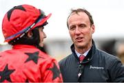 15 March 2023; Former jockey Robbie Power speaks with Darragh O'Keeffe after the Johnny Henderson Grand Annual Challenge Cup Handicap Chase during day two of the Cheltenham Racing Festival at Prestbury Park in Cheltenham, England. Photo by Harry Murphy/Sportsfile