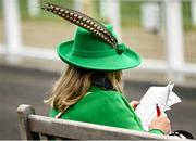 16 March 2023; A racegoer studies the form before racing on day three of the Cheltenham Racing Festival at Prestbury Park in Cheltenham, England. Photo by Harry Murphy/Sportsfile