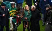 16 March 2023; Winning connections including trainer Gordon Elliott, jockey Mark Walsh, groom Elise Elliott, JP McManus and Noreen McManus with Sire Du Berlais after winning the Paddy Power Stayers' Hurdle during day three of the Cheltenham Racing Festival at Prestbury Park in Cheltenham, England. Photo by Harry Murphy/Sportsfile