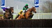 16 March 2023; Jockey Ben Harvey, right, jumps the last on Seddon as they go on to win the Magners Plate Handicap Chase during day three of the Cheltenham Racing Festival at Prestbury Park in Cheltenham, England. Photo by Seb Daly/Sportsfile