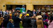 16 March 2023; You Wear It Well, with Gavin Sheehan up, arrive in the parade ring after winning the Jack De Bromhead Mares' Novices' Hurdle during day three of the Cheltenham Racing Festival at Prestbury Park in Cheltenham, England. Photo by Harry Murphy/Sportsfile