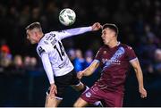 16 March 2023; Dayle Rooney of Drogheda United in action against Cameron Elliott of Dundalk during the SSE Airtricity Men's Premier Division match between Drogheda United and Dundalk at Weavers Park in Drogheda, Louth. Photo by Stephen McCarthy/Sportsfile