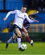 16 March 2023; Cameron Elliott of Dundalk in action against Gary Deegan of Drogheda United during the SSE Airtricity Men's Premier Division match between Drogheda United and Dundalk at Weavers Park in Drogheda, Louth. Photo by Stephen McCarthy/Sportsfile