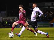 16 March 2023; Darragh Markey of Drogheda United in action against Rayhaan Tulloch of Dundalk during the SSE Airtricity Men's Premier Division match between Drogheda United and Dundalk at Weavers Park in Drogheda, Louth. Photo by Stephen McCarthy/Sportsfile