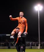 16 March 2023; Dundalk goalkeeper Nathan Shepperd is lifted by team-mate Mark Byrne in celebration after the SSE Airtricity Men's Premier Division match between Drogheda United and Dundalk at Weavers Park in Drogheda, Louth. Photo by Stephen McCarthy/Sportsfile