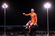 16 March 2023; Dundalk goalkeeper Nathan Shepperd is lifted by team-mate Mark Byrne in celebration after the SSE Airtricity Men's Premier Division match between Drogheda United and Dundalk at Weavers Park in Drogheda, Louth. Photo by Stephen McCarthy/Sportsfile