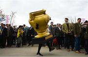 17 March 2023; A Gold Cup mascot dances before racing on day four of the Cheltenham Racing Festival at Prestbury Park in Cheltenham, England. Photo by Harry Murphy/Sportsfile