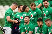 17 March 2023; Jonathan Sexton joins the team photograph before the Ireland rugby captain's run at the Aviva Stadium in Dublin. Photo by Ramsey Cardy/Sportsfile