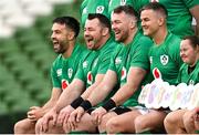 17 March 2023; Ireland players, from right, to left, Jonathan Sexton, Peter O’Mahony, Cian Healy and Conor Murray, share a joke in the company of Ireland supporter Jennifer Malone, during the Ireland rugby captain's run at the Aviva Stadium in Dublin. Photo by Ramsey Cardy/Sportsfile