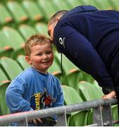 17 March 2023; Head coach Andy Farrell, with his grandson Tommy, during the Ireland rugby captain's run at the Aviva Stadium in Dublin. Photo by Ramsey Cardy/Sportsfile