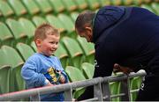 17 March 2023; Head coach Andy Farrell, with his grandson Tommy, during the Ireland rugby captain's run at the Aviva Stadium in Dublin. Photo by Ramsey Cardy/Sportsfile