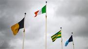 17 March 2023; The Irish tricolour flies alongside flags representing, from left, St Eunan's GAA Club, Donegal and Dublin before the Lidl Ladies National Football League Division 1 match between Donegal and Dublin at O’Donnell Park in Letterkenny, Donegal. Photo by Stephen McCarthy/Sportsfile
