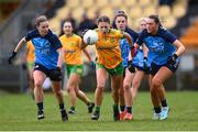 17 March 2023; Tara Hegarty of Donegal in action against Dublin players, from left, Orlagh Nolan, Kate Sullivan and Niamh Hetherton during the Lidl Ladies National Football League Division 1 match between Donegal and Dublin at O’Donnell Park in Letterkenny, Donegal. Photo by Stephen McCarthy/Sportsfile