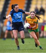 17 March 2023; Tara Hegarty of Donegal is tackled by Hannah Tyrrell of Dublin during the Lidl Ladies National Football League Division 1 match between Donegal and Dublin at O’Donnell Park in Letterkenny, Donegal. Photo by Stephen McCarthy/Sportsfile