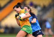 17 March 2023; Nicole McLaughlin of Donegal in action against Martha Byrne of Dublin during the Lidl Ladies National Football League Division 1 match between Donegal and Dublin at O’Donnell Park in Letterkenny, Donegal. Photo by Stephen McCarthy/Sportsfile
