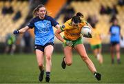 17 March 2023; Nicole McLaughlin of Donegal in action against Martha Byrne of Dublin during the Lidl Ladies National Football League Division 1 match between Donegal and Dublin at O’Donnell Park in Letterkenny, Donegal. Photo by Stephen McCarthy/Sportsfile