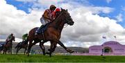 17 March 2023; Jockey Bridget Andrews on Faivoir, reacts as they beat Pied Piper, with Davy Russell up, on the field to win the McCoy Contractors County Handicap Hurdle during day four of the Cheltenham Racing Festival at Prestbury Park in Cheltenham, England. Photo by Seb Daly/Sportsfile