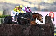 17 March 2023; Galopin Des Champs, left, with Paul Townend up, jump clear of Bravemansgame, with Harry Cobden up, over the last on their way to winning the Boodles Cheltenham Gold Cup Chase during day four of the Cheltenham Racing Festival at Prestbury Park in Cheltenham, England. Photo by Harry Murphy/Sportsfile