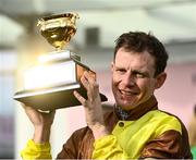 17 March 2023; Winning jockey Paul Townend celebrates with the Gold Cup after Galopin Des Champs had won the Boodles Cheltenham Gold Cup Chase during day four of the Cheltenham Racing Festival at Prestbury Park in Cheltenham, England. Photo by Harry Murphy/Sportsfile