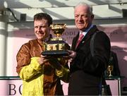 17 March 2023; Winning jockey Paul Townend and trainer Willie Mullins celebrate with the Gold Cup after Galopin Des Champs had won the Boodles Cheltenham Gold Cup Chase during day four of the Cheltenham Racing Festival at Prestbury Park in Cheltenham, England. Photo by Harry Murphy/Sportsfile