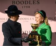 17 March 2023; Anne, Princess Royal, presents the Gold Cup to owner Audrey Turley after she had won the Boodles Cheltenham Gold Cup Chase with  Galopin Des Champsduring day four of the Cheltenham Racing Festival at Prestbury Park in Cheltenham, England. Photo by Harry Murphy/Sportsfile