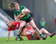 17 March 2023; Anna Galvin of Kerry in action against Rachel Leahy, left, and Melissa Duggan of Cork during the Lidl Ladies National Football League Division 1 match between Cork and Kerry at Páirc Uí Chaoimh in Cork. Photo by Piaras Ó Mídheach/Sportsfile