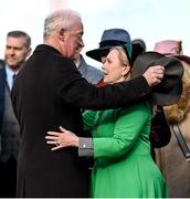 17 March 2023; Winning owner Audrey Turley and trainer Willie Mullins embrace after winning the Boodles Cheltenham Gold Cup Chase during day four of the Cheltenham Racing Festival at Prestbury Park in Cheltenham, England. Photo by Harry Murphy/Sportsfile