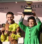 17 March 2023; Winning owner Audrey Turley, with the Gold Cup, and jockey Paul Townend after winning the Boodles Cheltenham Gold Cup Chase during day four of the Cheltenham Racing Festival at Prestbury Park in Cheltenham, England. Photo by Harry Murphy/Sportsfile