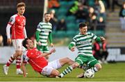 17 March 2023; Trevor Clarke of Shamrock Rovers is fouled by Vladislav Kreida of St Patrick's Athletic during the SSE Airtricity Men's Premier Division match between Shamrock Rovers and St Patrick's Athletic at Tallaght Stadium in Dublin. Photo by Ramsey Cardy/Sportsfile